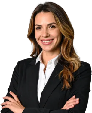 Woman in a black blazer with folded arms.